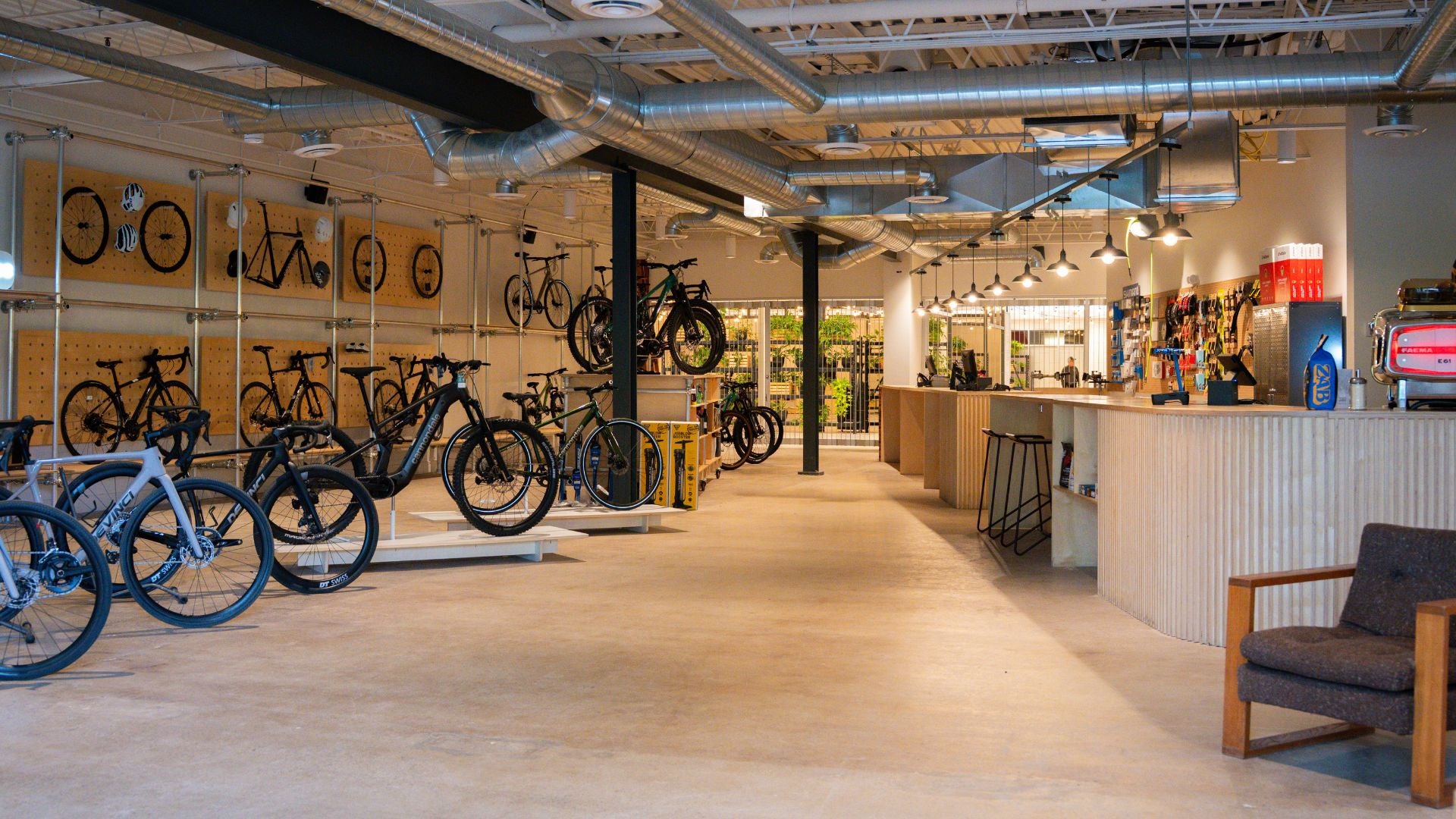 Modern bike store interior with various bicycles on display.