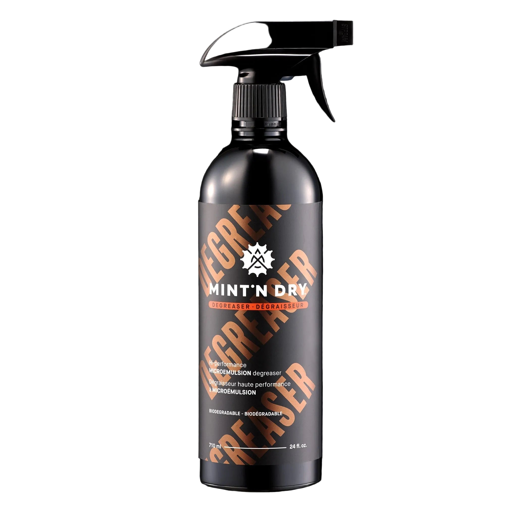 Black spray bottle with 'Mint'n Dry' branding 